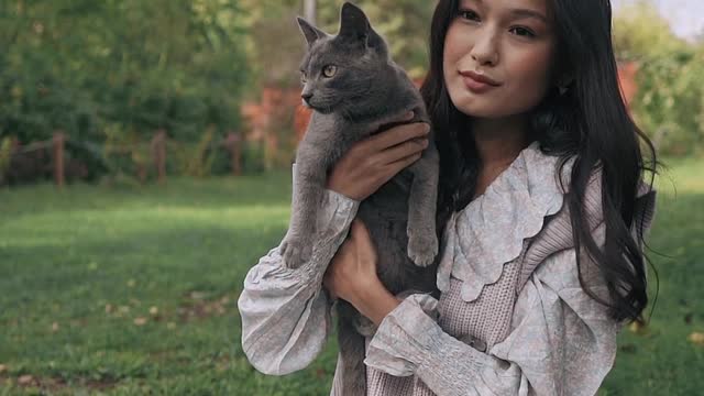 person-holding-a-cat