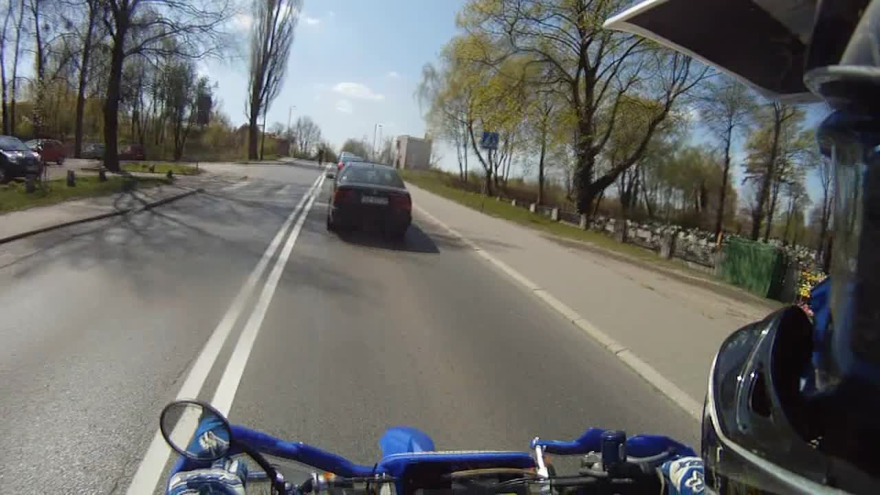 Biker randomly surprises passing cyclist with high-five