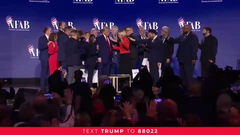 Pastors pray over President Trump before he departs the National Faith Summit in Powder Springs, GA