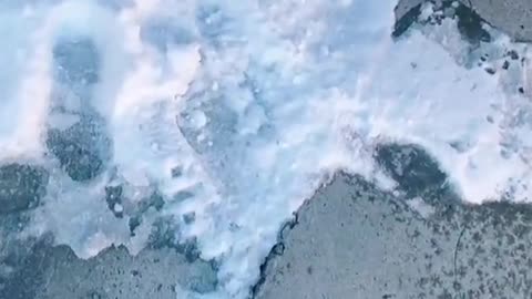 Frozen Money Found in Snow Filled Driveway