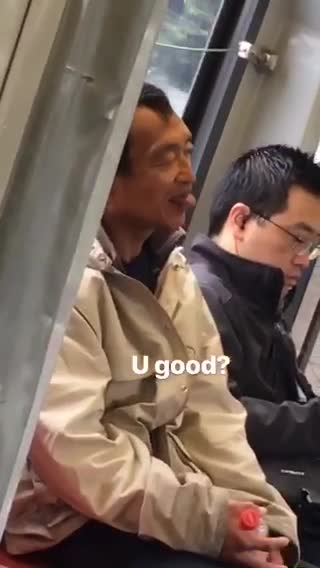 Man flicks his tongue up and down on subway train