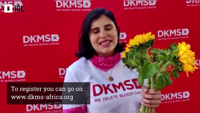 The DKMS team handing out 510 sunflowers