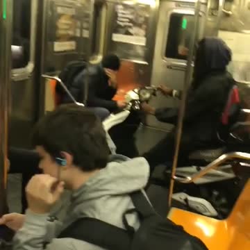 Guy subway white moped motorcycle