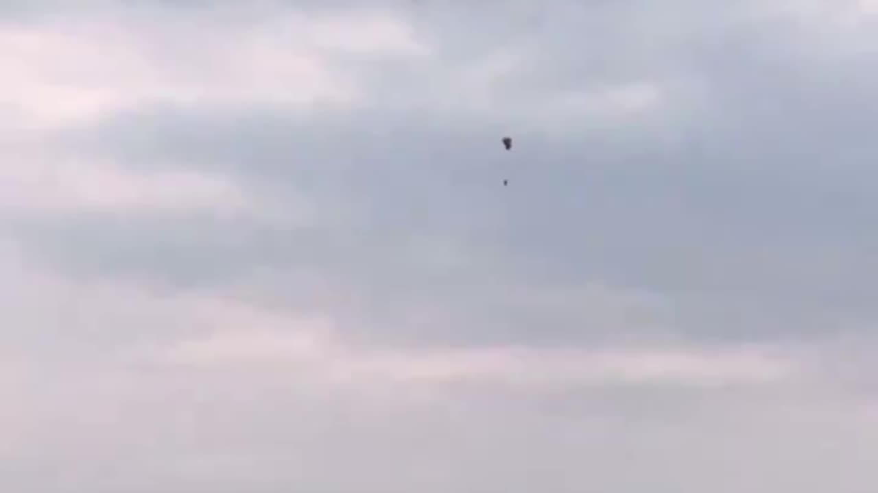 Anti-Israel protesters launch a large balloon in front of JFK Airport,