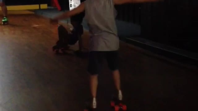 Two young kids fail at rollerskating