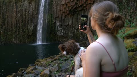 woman looking the watarfalls