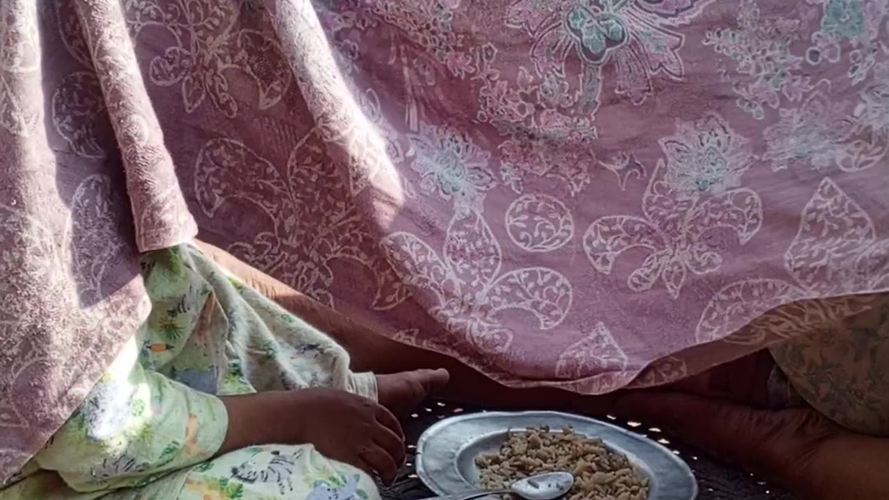 My mother and my sweet son eating rice