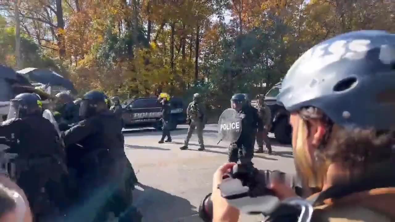 Police clashing with No Cop City BLM Antifa clowns