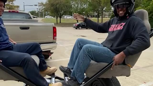 Men Experiencing a Custom Built Spinning Chair Ride