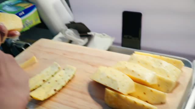 Cute guy cut pineapple melon