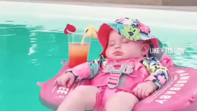 Cute baby sleep on water tube