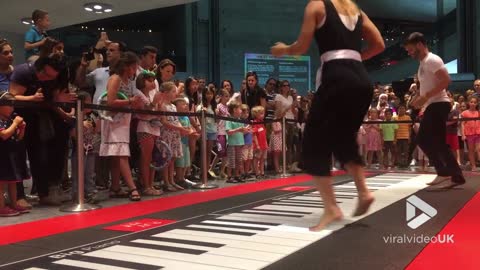 Big on giant piano