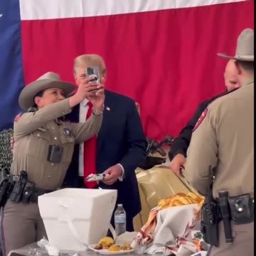 President Trump Handing Out Items, As He Meets With Texas Border Agents