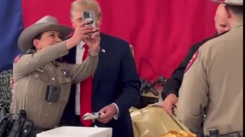 President Trump Handing Out Items, As He Meets With Texas Border Agents
