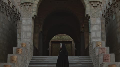 a-person-climbing-the-mosque-stairs