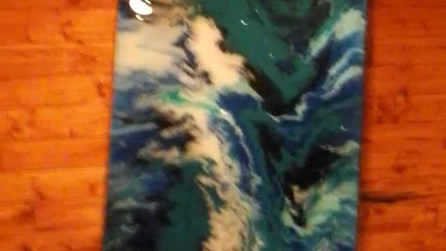 Acrylic pour paint, covered in Epoxy.