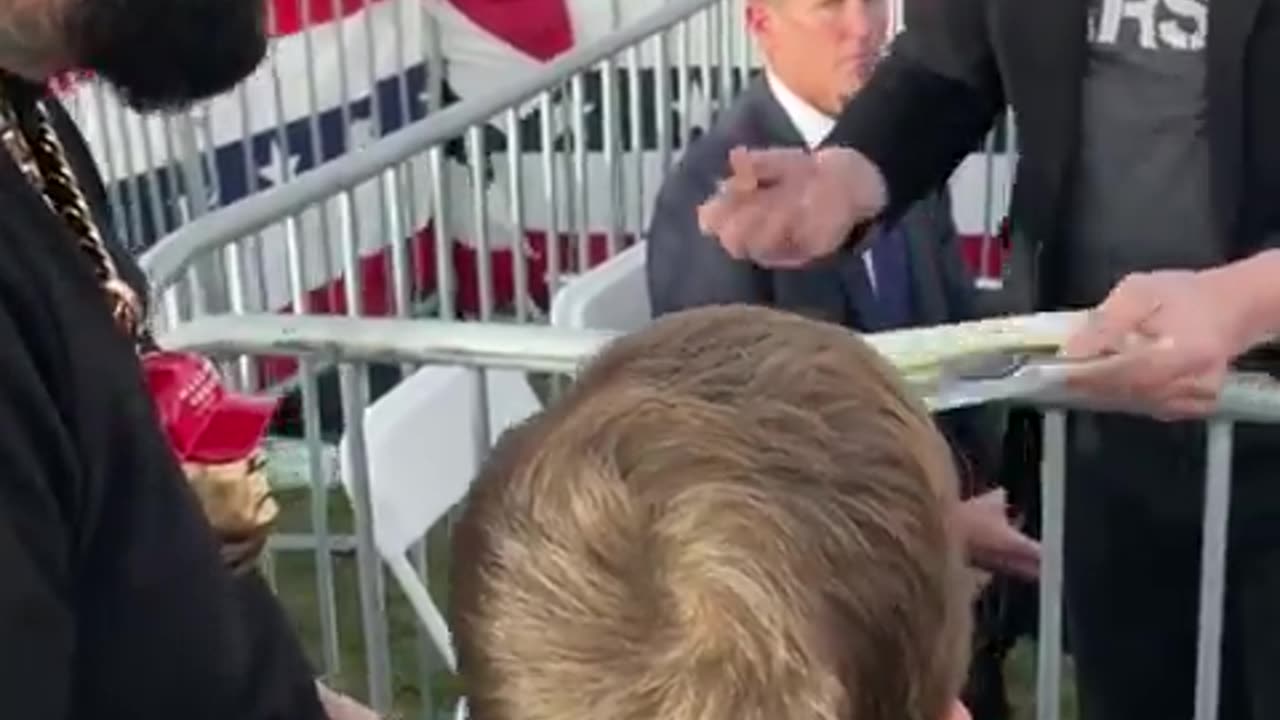 Beautiful Moment Kid Gets His Cyber Truck Picture Signed By Elon Musk at Trump Rally