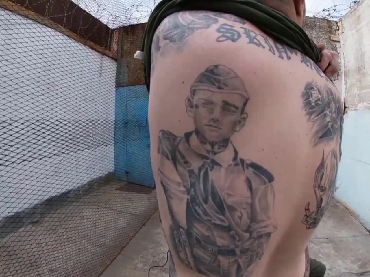 Ukrainain POWs "condemn" their Nazi tattoos - "because it's in the past now.