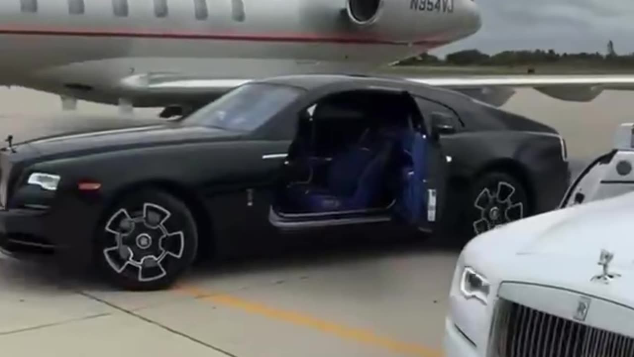 Private jet and Rolls-Royce dream car lifestyle and enjoyment