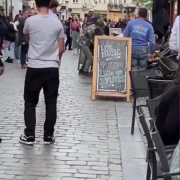 “ Belgian This migrant started throwing stuff at people eating and quickly found out...”