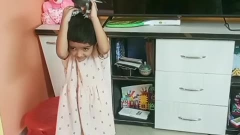 Baby playing pigeon