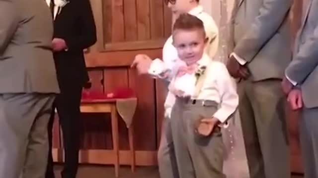 Kid add some comedy to wedding