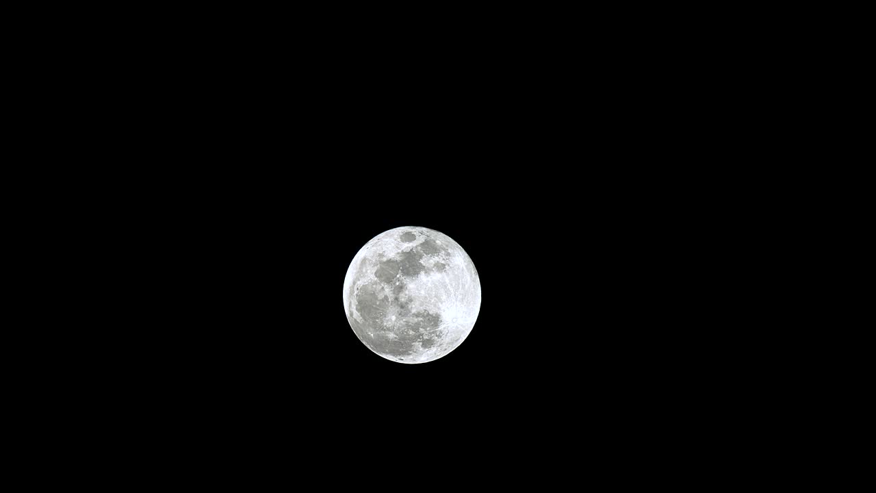 Silver moon in the dark sky