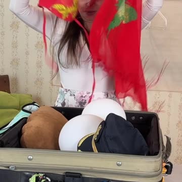 Bikini fitting and suitcase packing