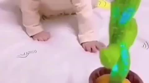 Funny baby with toy 😂