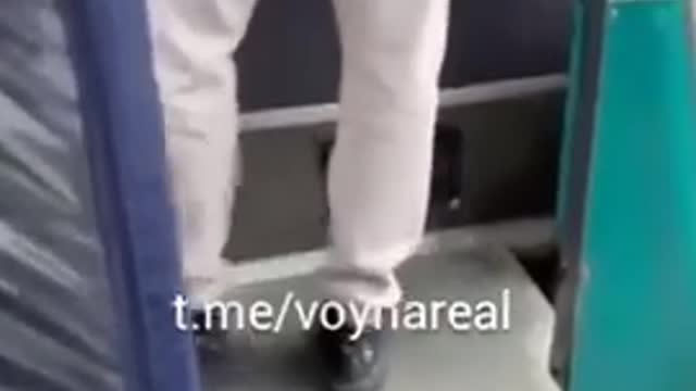 Russian “veteran” Legless soldier denied access to a minibus and chased off with a bat