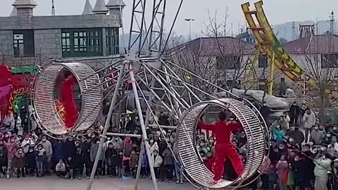 Acrobats perform death-defying stunts.hd