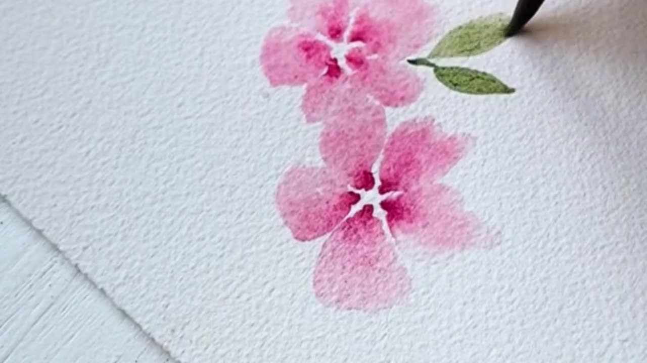 If you’re stuck with watercolor flowers, try this easy way to paint perfect little petals every time