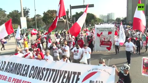 Hundreds of protesters marched through the streets of Lima