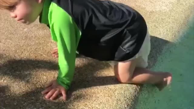 Toddler Swims with Diaper on, Waddles Like Duck