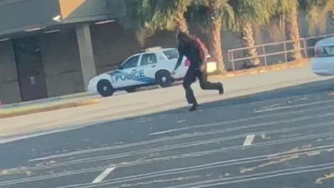 Police Car Crashes into Parked Car