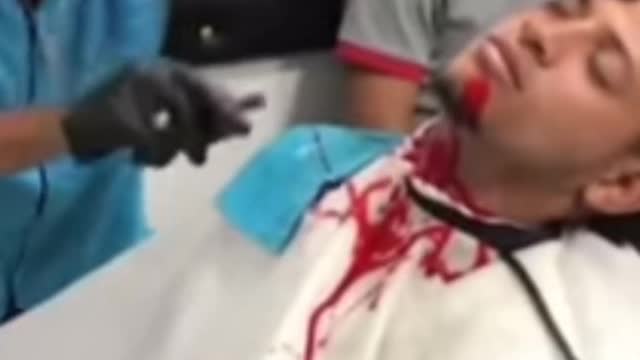 The customer faints when he sees the blood