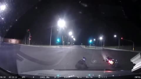 Bikers attempt at wheelie goes wrong