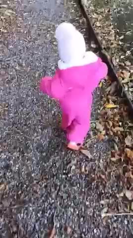 Little girl has happy waddle walk