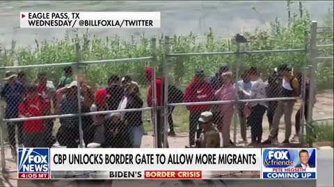 'Unbelievable' video shows border agents opening gate to migrants