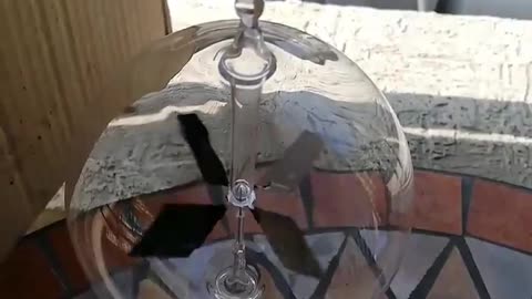 A solar radiometer is a windmill in vacuum glass bulb powered by sunlight