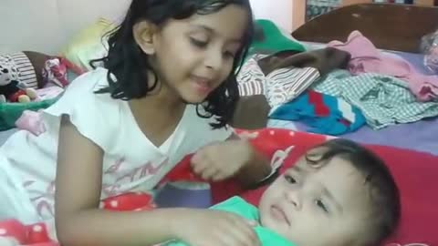 Singing a poem by a kind sister to her baby brother