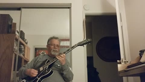 OLD MAN WARMING UP GUITAR