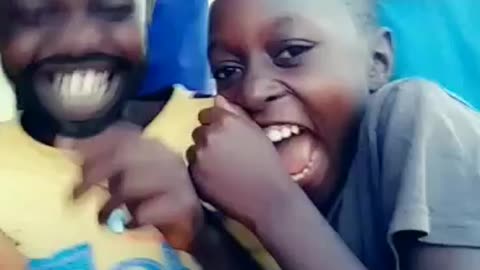 Uganda village children experience snapchat for the first time