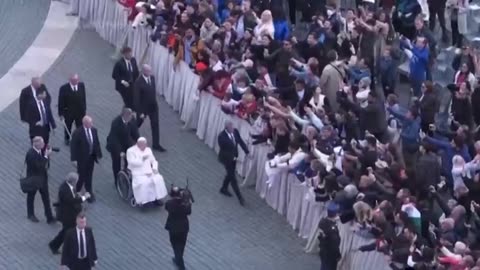 Meanwhile, the pope is unable to get into his pope mobile