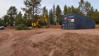 Our container shop and running water lines and electricity