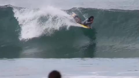 Surfing in the Ocean with inspiring music