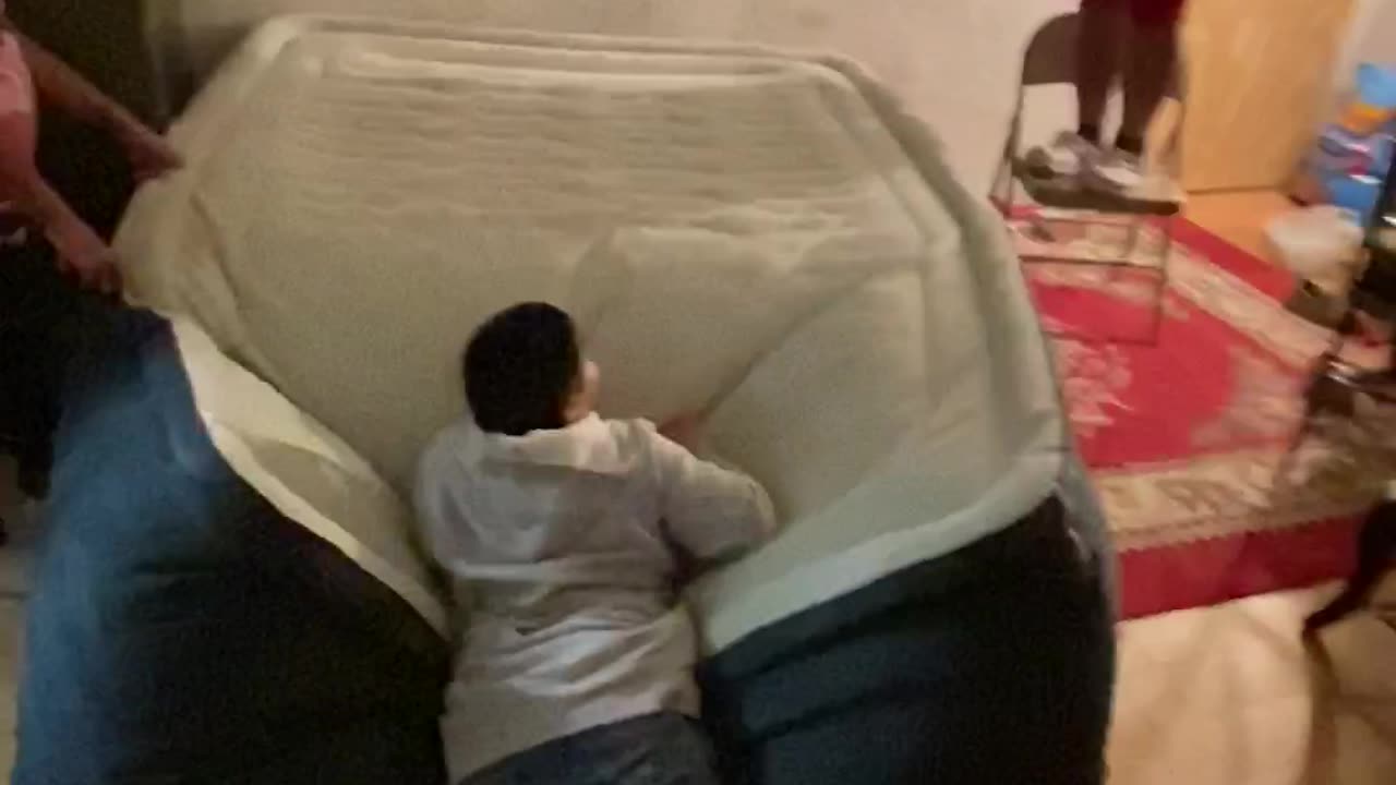 Girl Goes Flying When Brother Jumps on Air Mattress