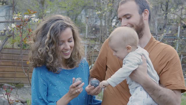 Happy Family Outside with baby