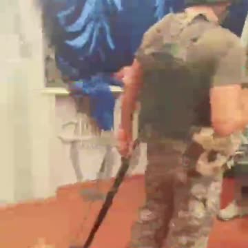 Ukraine soliders inside a children's school with weapons