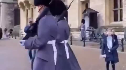 British Soldiers Walk Over Kid